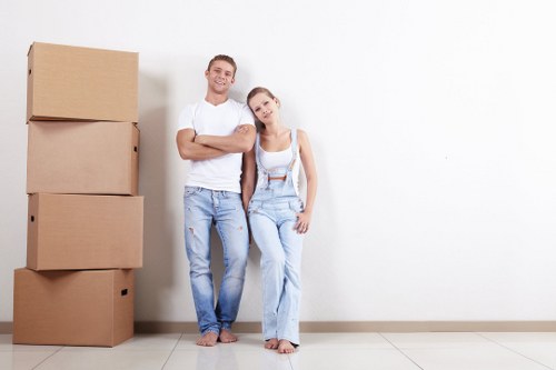 Man loading a van with furniture for a home move