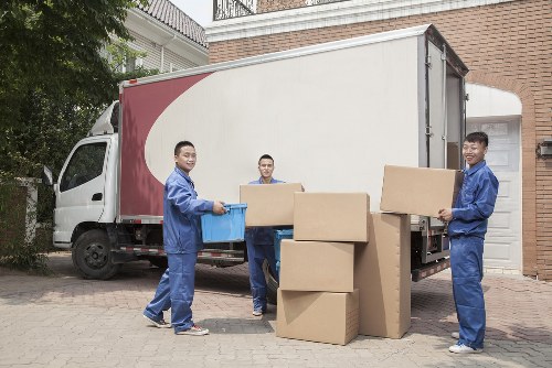 Man with a van loading furniture for a move