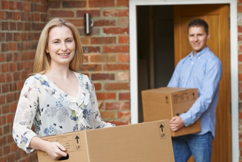 Professional movers handling furniture